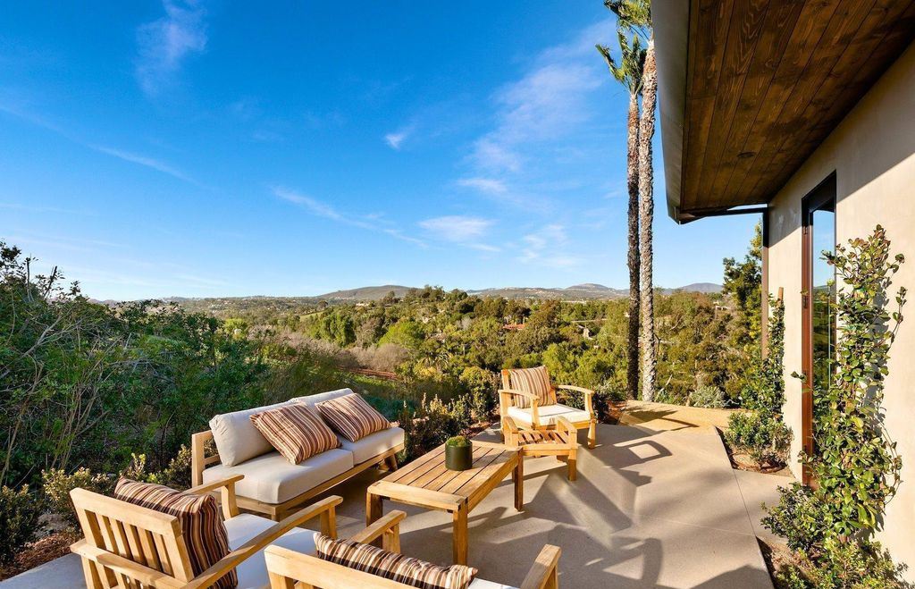 The Home in Rancho Santa Fe is an exquisite luxury oasis conceived by top team builder & design visionaries offering incomparable unobstructed views now available for sale. This house located at 18080 Via De Fortuna, Rancho Santa Fe, California