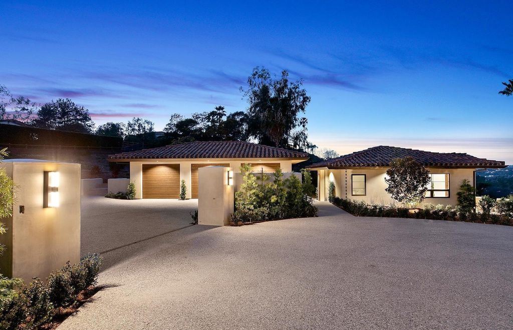 The Home in Rancho Santa Fe is an exquisite luxury oasis conceived by top team builder & design visionaries offering incomparable unobstructed views now available for sale. This house located at 18080 Via De Fortuna, Rancho Santa Fe, California