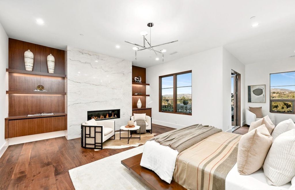 The Home in Rancho Santa Fe is an exquisite luxury oasis conceived by top team builder & design visionaries offering incomparable unobstructed views now available for sale. This house located at 18080 Via De Fortuna, Rancho Santa Fe, California