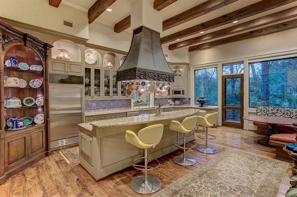 The Home in Houston is a magnificent custom designed estate with one of a kind architectural appointments now available for sale. This home located at 8843 Harness Creek Ln, Houston, Texas