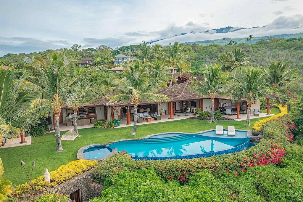 The Home in Hawaii is a luxurious home featuring seamless indoor-outdoor contemporary design now available for sale. This home located at 26 Ualei Pl, Kihei, Hawaii; offering 05 bedrooms and 06 bathrooms with 4,383 square feet of living spaces.