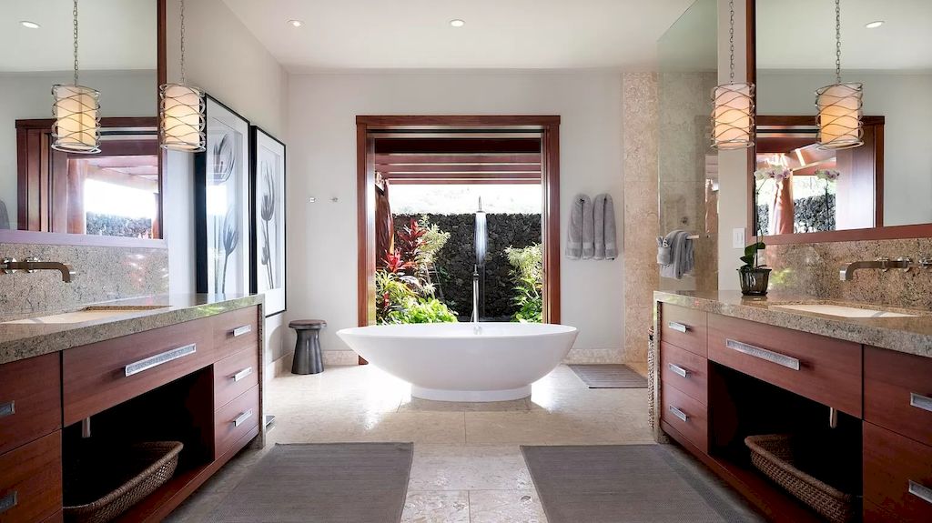 The Home in Hawaii is a luxurious home featuring seamless indoor-outdoor contemporary design now available for sale. This home located at 26 Ualei Pl, Kihei, Hawaii; offering 05 bedrooms and 06 bathrooms with 4,383 square feet of living spaces.