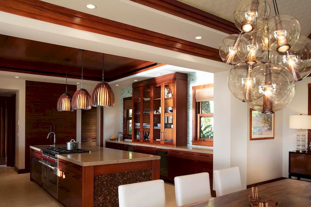 The Home in Hawaii is a luxurious home featuring seamless indoor-outdoor contemporary design now available for sale. This home located at 26 Ualei Pl, Kihei, Hawaii; offering 05 bedrooms and 06 bathrooms with 4,383 square feet of living spaces.