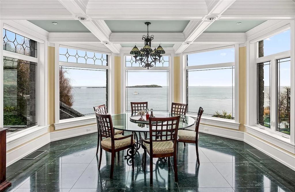 The House in Oak Bay is entertainment haven complete with resort style living with a pool, hot tub, expansive patio sections including covered sections & oceanfront setting with beach access now available for sale