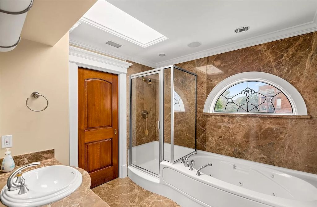 The House in Oak Bay is entertainment haven complete with resort style living with a pool, hot tub, expansive patio sections including covered sections & oceanfront setting with beach access now available for sale