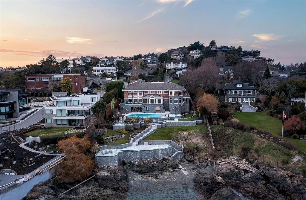 The House in Oak Bay is entertainment haven complete with resort style living with a pool, hot tub, expansive patio sections including covered sections & oceanfront setting with beach access now available for sale