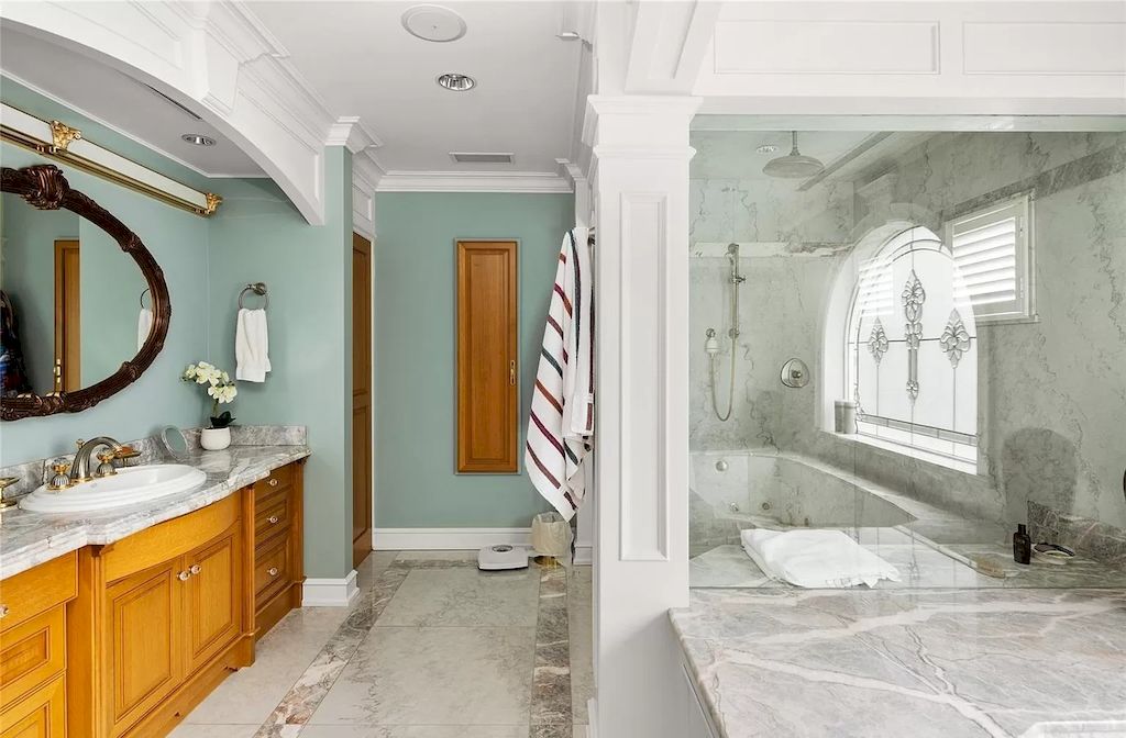 The House in Oak Bay is entertainment haven complete with resort style living with a pool, hot tub, expansive patio sections including covered sections & oceanfront setting with beach access now available for sale