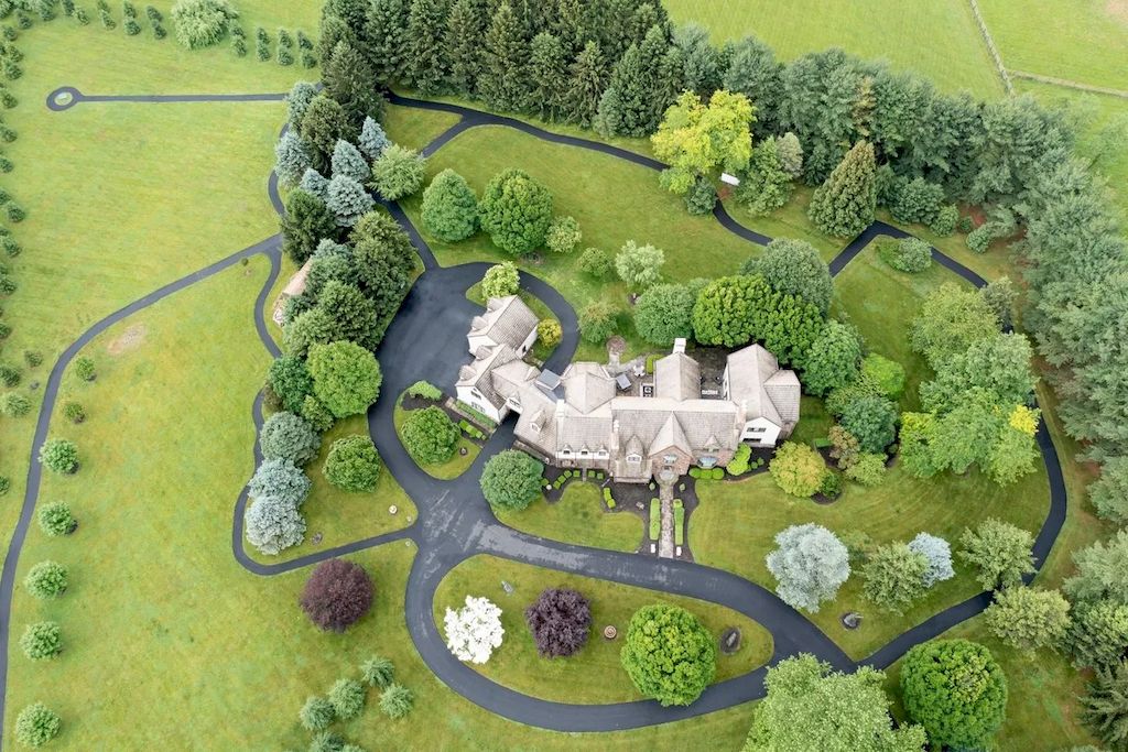 The Home in Pennsylvania is a luxurious home set on a lush, private, secure and park-like setting now available for sale. This home located at 6040 Lower Mountain Rd, New Hope, Pennsylvania; offering 06 bedrooms and 08 bathrooms with 11,500 square feet of living spaces.