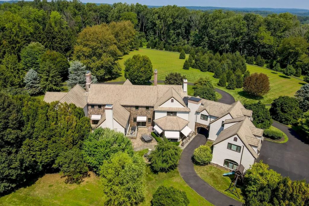 The Home in Pennsylvania is a luxurious home set on a lush, private, secure and park-like setting now available for sale. This home located at 6040 Lower Mountain Rd, New Hope, Pennsylvania; offering 06 bedrooms and 08 bathrooms with 11,500 square feet of living spaces.