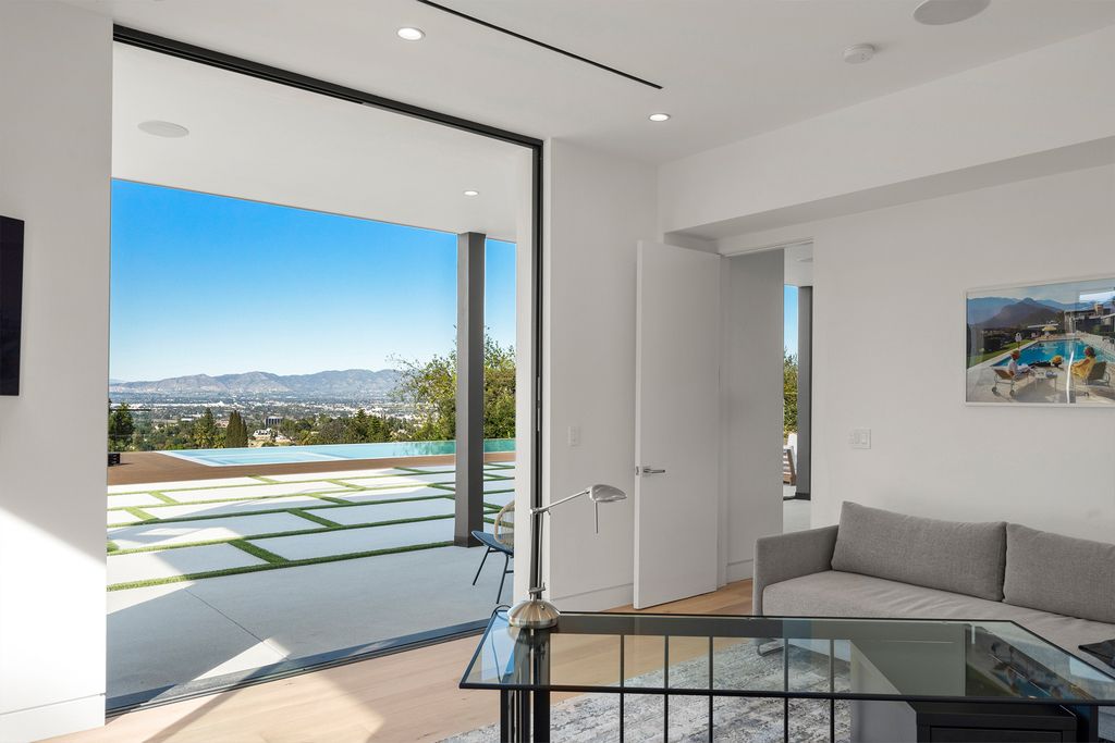 The Home in Sherman Oaks is a recently built modern masterpiece with unobstructed views of the city and mountains now available for sale. This home located at 3369 Alana Dr, Sherman Oaks, California;