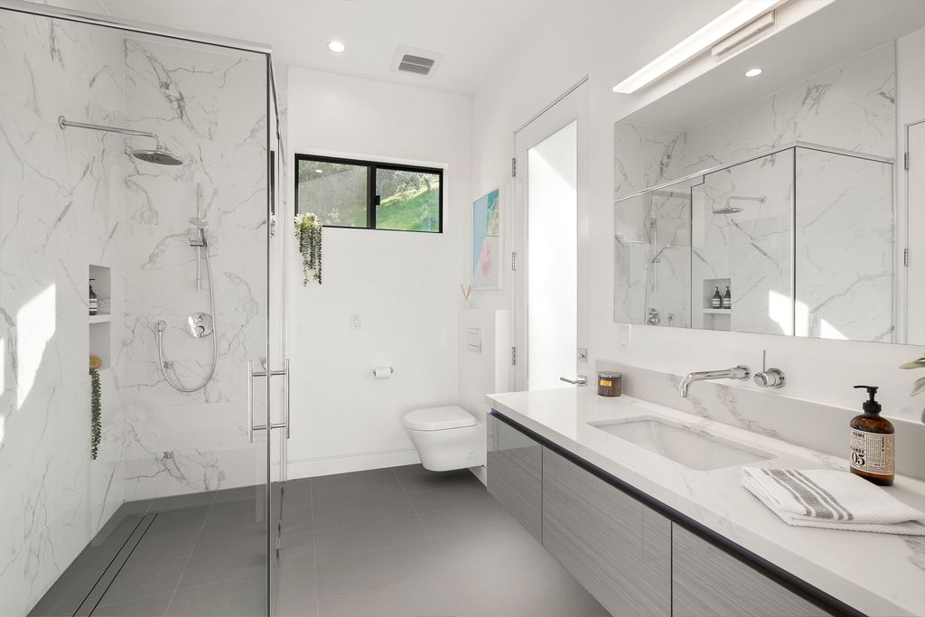 The Home in Sherman Oaks is a recently built modern masterpiece with unobstructed views of the city and mountains now available for sale. This home located at 3369 Alana Dr, Sherman Oaks, California;