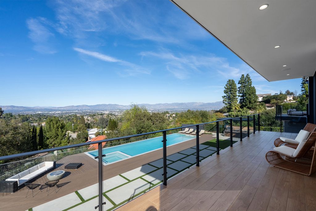 The Home in Sherman Oaks is a recently built modern masterpiece with unobstructed views of the city and mountains now available for sale. This home located at 3369 Alana Dr, Sherman Oaks, California;