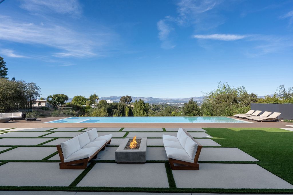 The Home in Sherman Oaks is a recently built modern masterpiece with unobstructed views of the city and mountains now available for sale. This home located at 3369 Alana Dr, Sherman Oaks, California;
