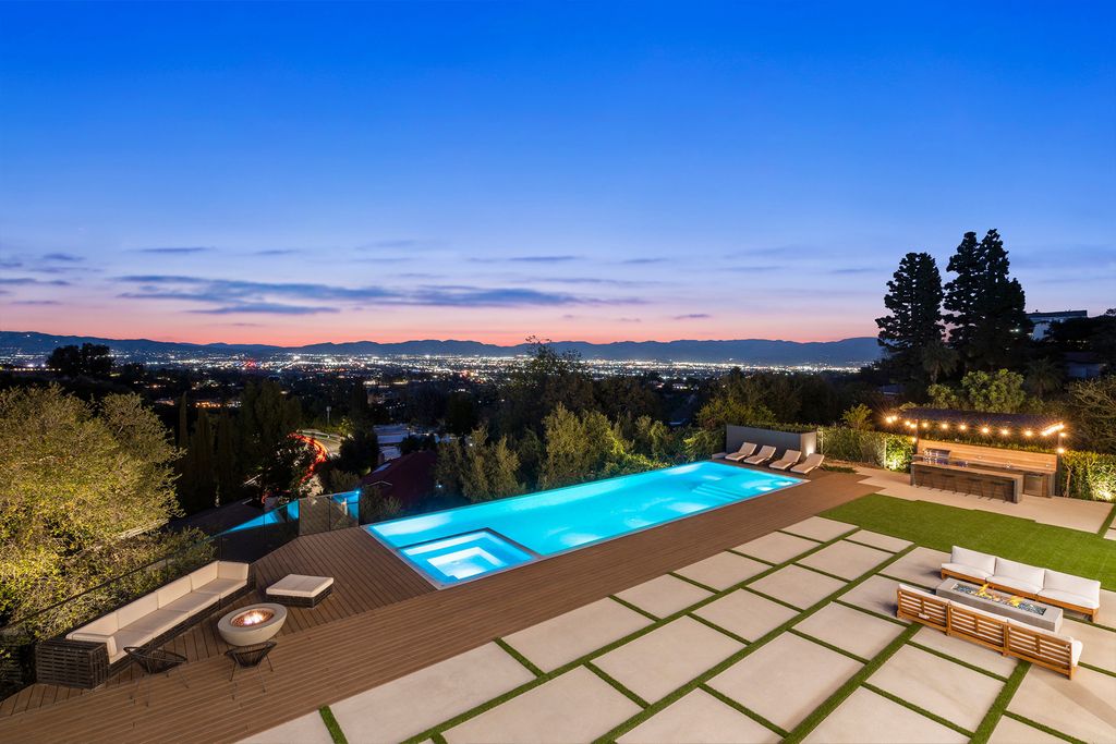 The Home in Sherman Oaks is a recently built modern masterpiece with unobstructed views of the city and mountains now available for sale. This home located at 3369 Alana Dr, Sherman Oaks, California;