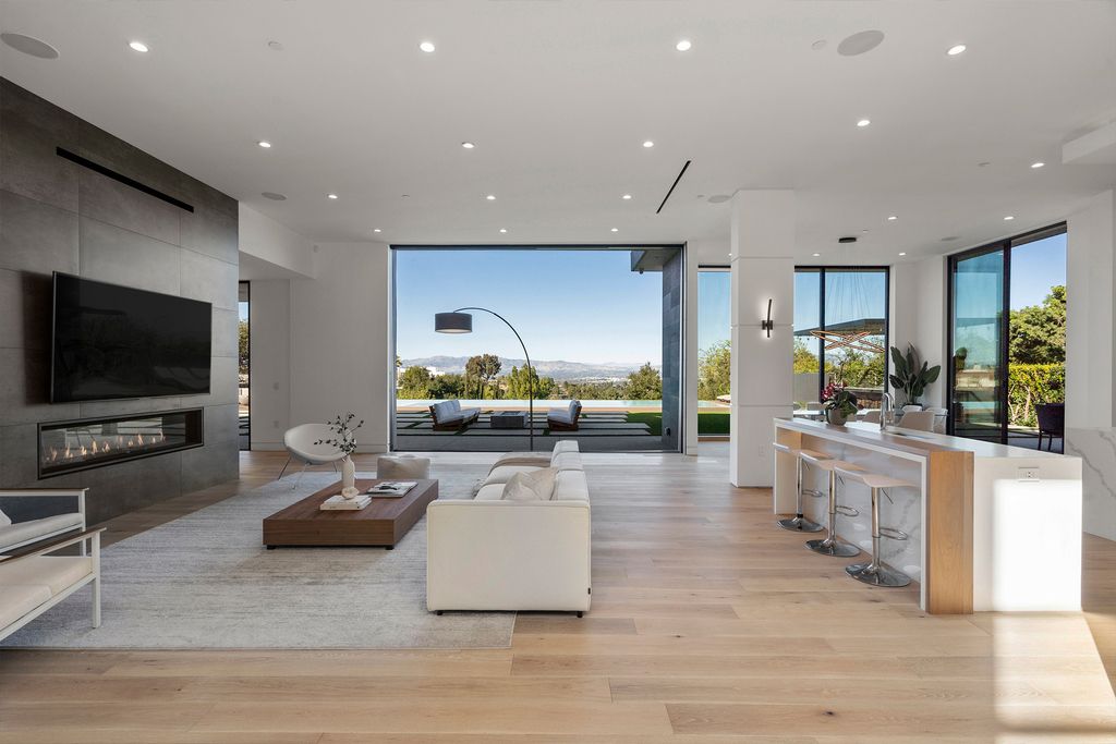 The Home in Sherman Oaks is a recently built modern masterpiece with unobstructed views of the city and mountains now available for sale. This home located at 3369 Alana Dr, Sherman Oaks, California;