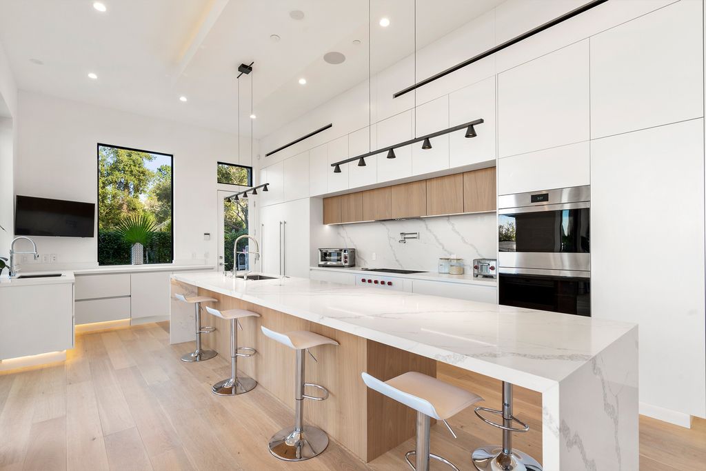 The Home in Sherman Oaks is a recently built modern masterpiece with unobstructed views of the city and mountains now available for sale. This home located at 3369 Alana Dr, Sherman Oaks, California;