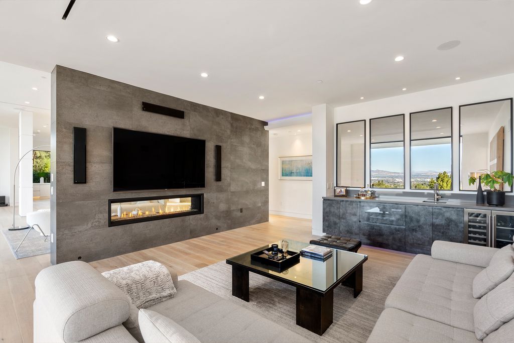 The Home in Sherman Oaks is a recently built modern masterpiece with unobstructed views of the city and mountains now available for sale. This home located at 3369 Alana Dr, Sherman Oaks, California;