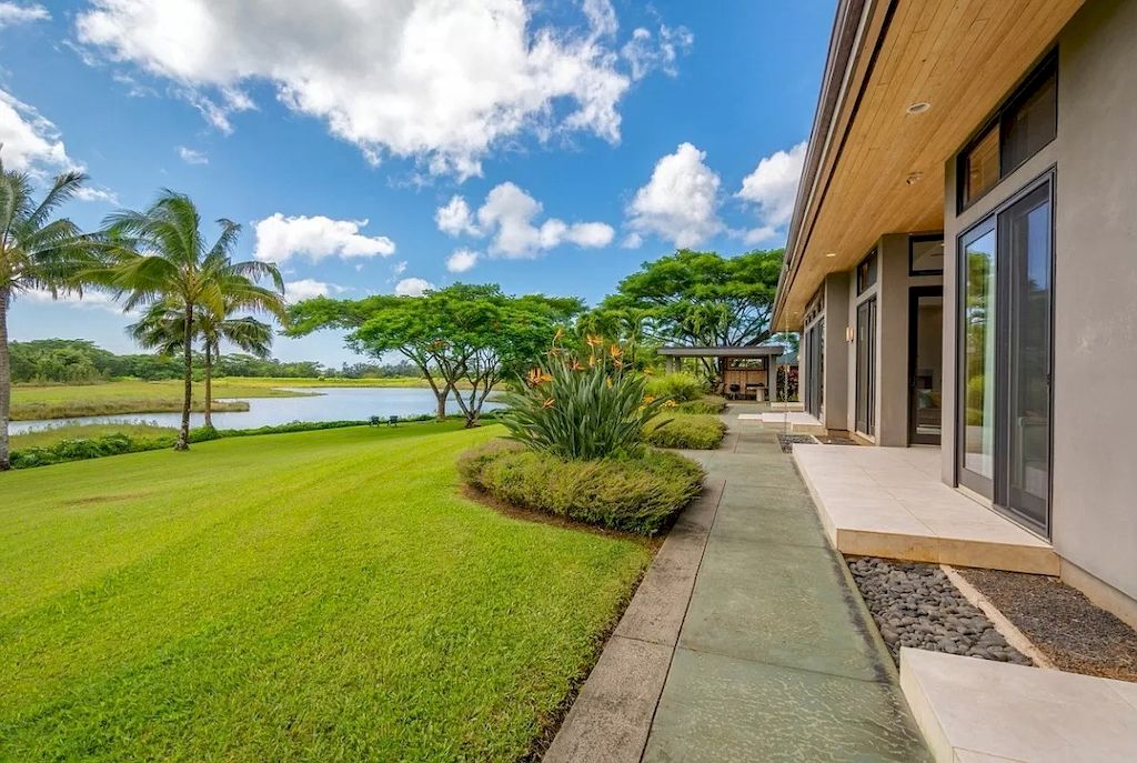 The Home in Hawaii is a luxurious home finished with high quality of design and materials now available for sale. This home located at 5792H Kahiliholo Rd #A, Kilauea, Hawaii; offering 04 bedrooms and 06 bathrooms with 4,511 square feet of living spaces.