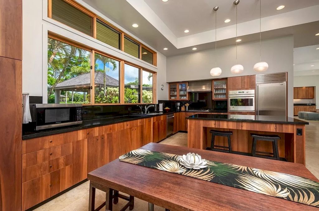 The Home in Hawaii is a luxurious home finished with high quality of design and materials now available for sale. This home located at 5792H Kahiliholo Rd #A, Kilauea, Hawaii; offering 04 bedrooms and 06 bathrooms with 4,511 square feet of living spaces.