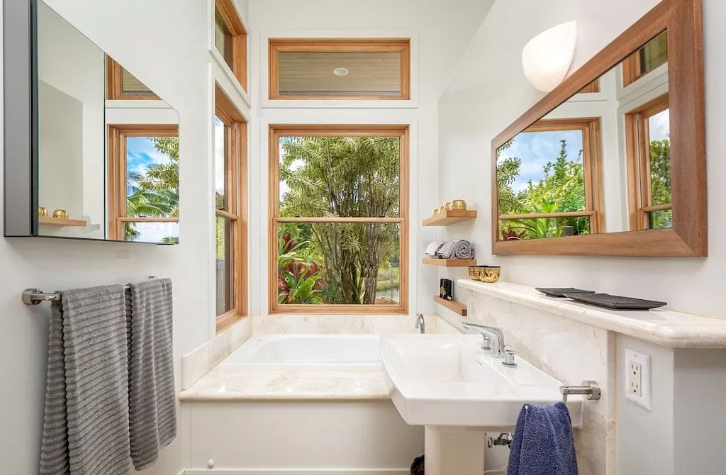 The Home in Hawaii is a luxurious home finished with high quality of design and materials now available for sale. This home located at 5792H Kahiliholo Rd #A, Kilauea, Hawaii; offering 04 bedrooms and 06 bathrooms with 4,511 square feet of living spaces.