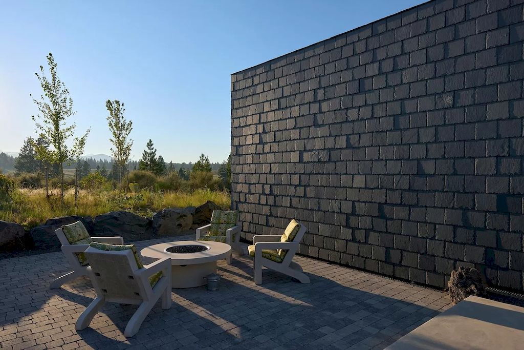The House in Oregon has numerous outdoor spaces allow for an undisturbed experience with nature now available for sale