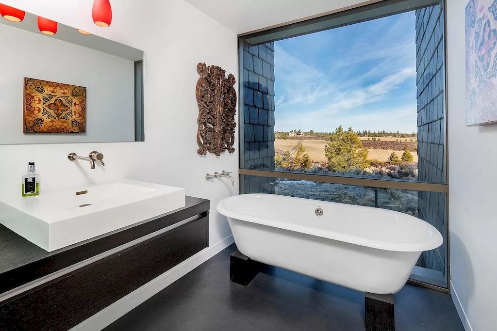 The House in Oregon has numerous outdoor spaces allow for an undisturbed experience with nature now available for sale