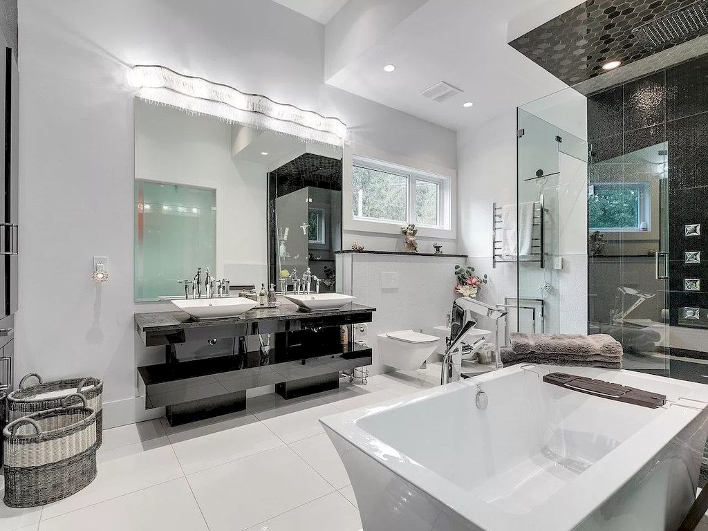 The Mansion in Surrey features beautiful outdoor entertainment area landscaped with high-quality turf, a south-east facing outdoor pool, mini-golf area available for sale