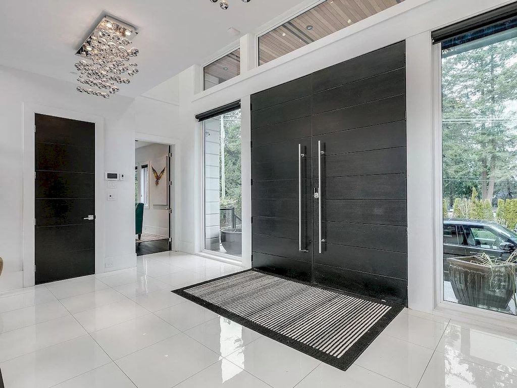 The Mansion in Surrey features beautiful outdoor entertainment area landscaped with high-quality turf, a south-east facing outdoor pool, mini-golf area available for sale
