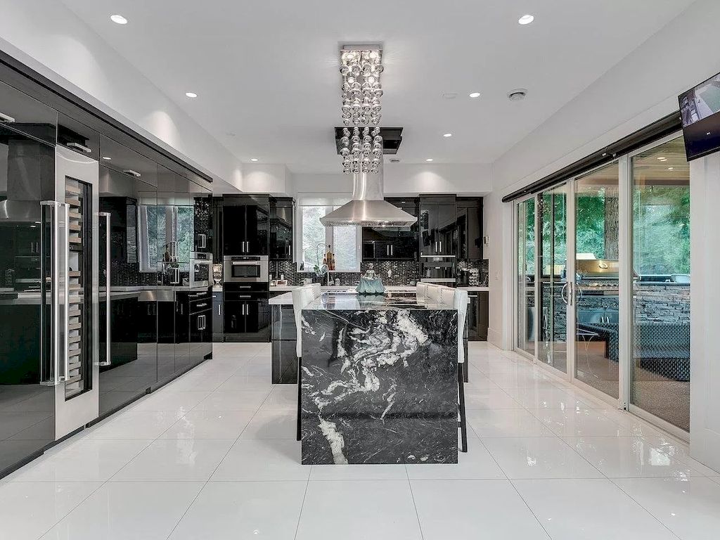 The Mansion in Surrey features beautiful outdoor entertainment area landscaped with high-quality turf, a south-east facing outdoor pool, mini-golf area available for sale