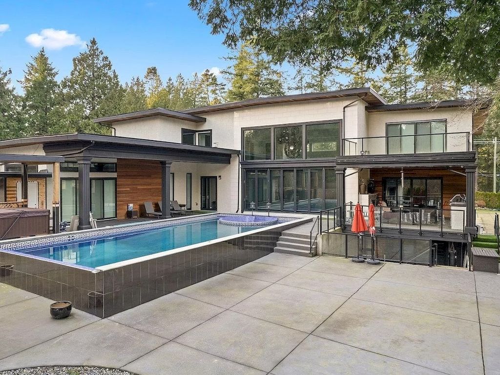 The Mansion in Surrey features beautiful outdoor entertainment area landscaped with high-quality turf, a south-east facing outdoor pool, mini-golf area available for sale