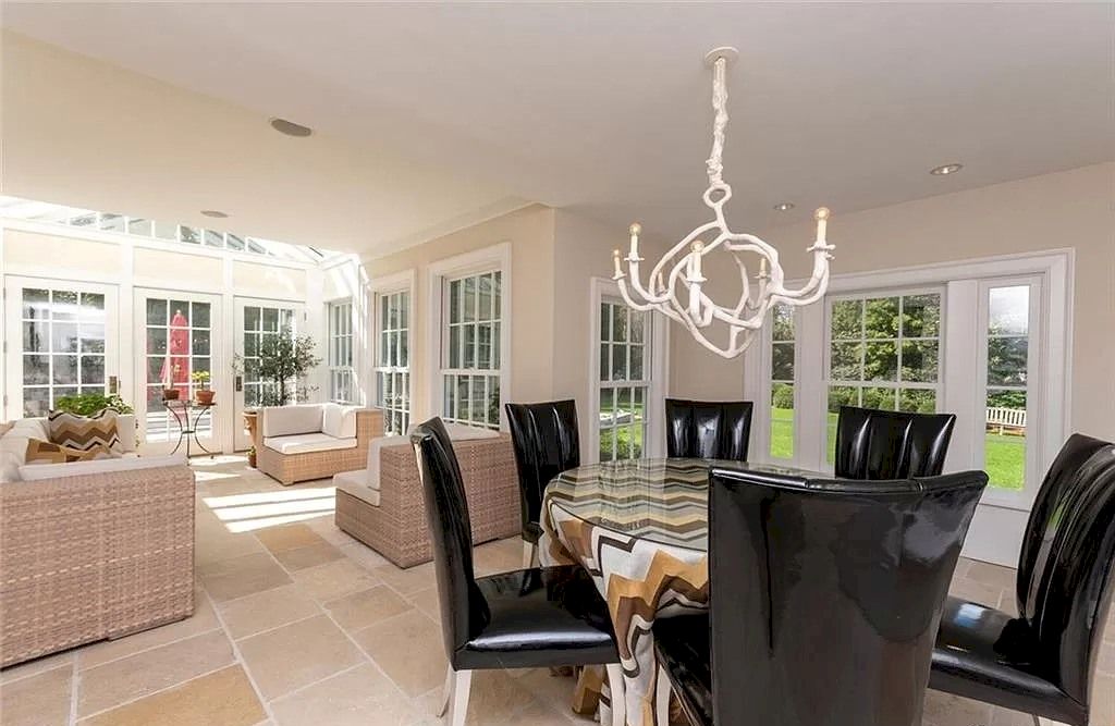 The Home in Connecticut is an extraordinary home with gracious entrance and amazing wine cellar now available for sale. This home located at 8 Searles Rd, Darien, Connecticut; offering 04 bedrooms and 07 bathrooms with 7,613 square feet of living spaces.
