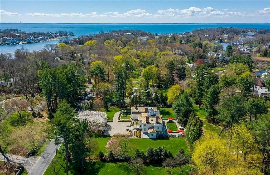 The Home in Connecticut is an extraordinary home with gracious entrance and amazing wine cellar now available for sale. This home located at 8 Searles Rd, Darien, Connecticut; offering 04 bedrooms and 07 bathrooms with 7,613 square feet of living spaces.