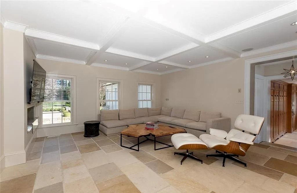 The Home in Connecticut is an extraordinary home with gracious entrance and amazing wine cellar now available for sale. This home located at 8 Searles Rd, Darien, Connecticut; offering 04 bedrooms and 07 bathrooms with 7,613 square feet of living spaces.