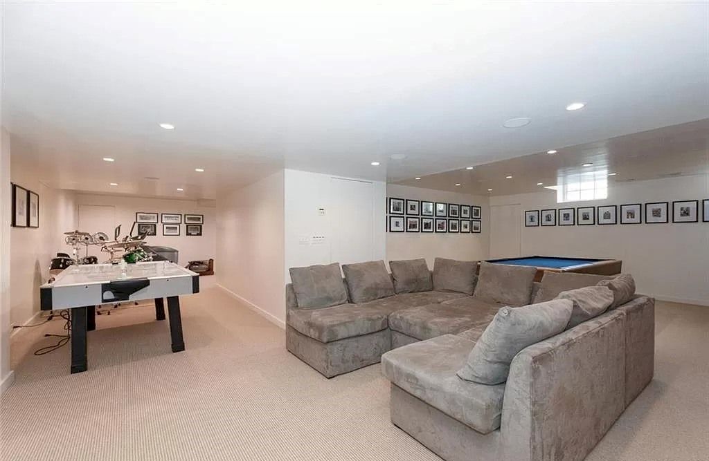 The Home in Connecticut is an extraordinary home with gracious entrance and amazing wine cellar now available for sale. This home located at 8 Searles Rd, Darien, Connecticut; offering 04 bedrooms and 07 bathrooms with 7,613 square feet of living spaces.