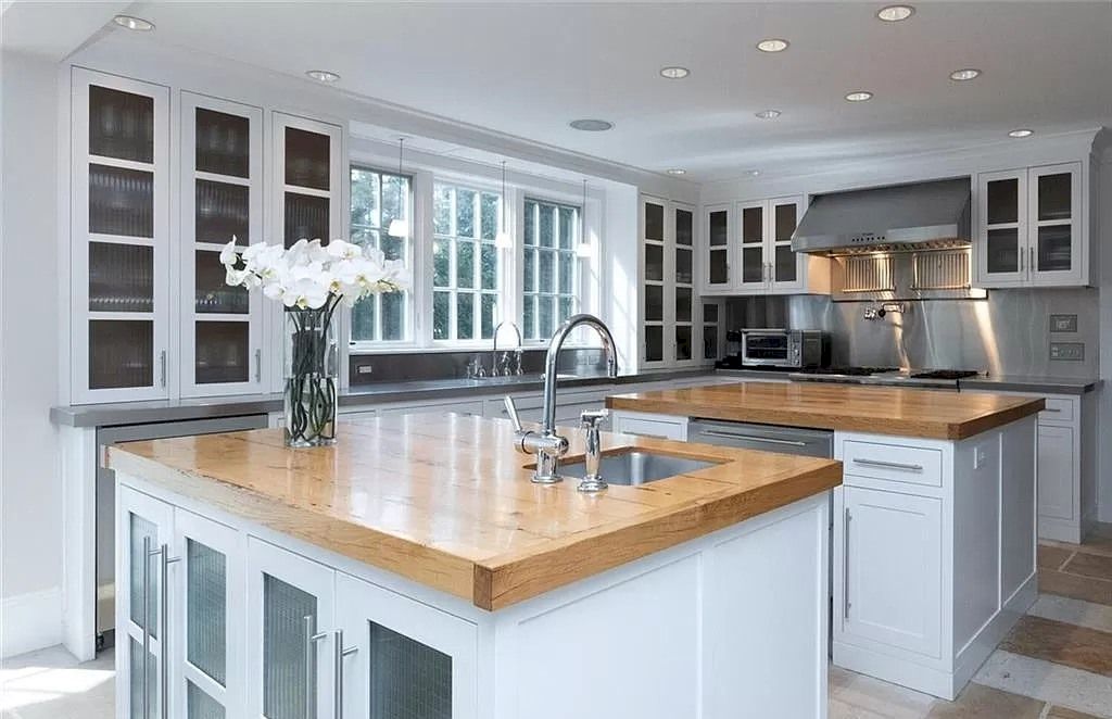 The Home in Connecticut is an extraordinary home with gracious entrance and amazing wine cellar now available for sale. This home located at 8 Searles Rd, Darien, Connecticut; offering 04 bedrooms and 07 bathrooms with 7,613 square feet of living spaces.