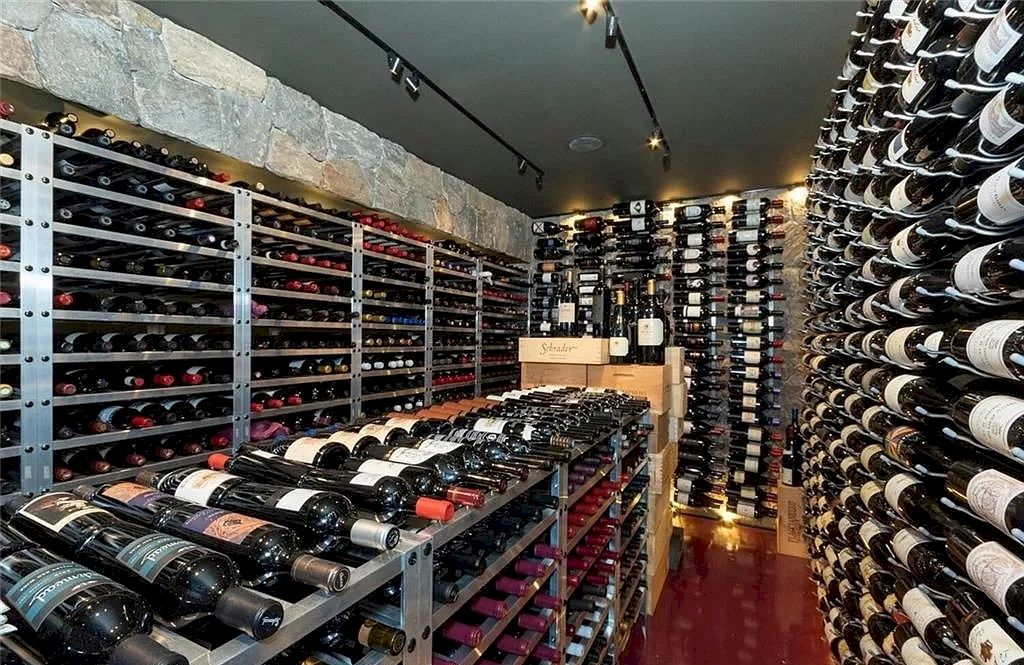 The Home in Connecticut is an extraordinary home with gracious entrance and amazing wine cellar now available for sale. This home located at 8 Searles Rd, Darien, Connecticut; offering 04 bedrooms and 07 bathrooms with 7,613 square feet of living spaces.