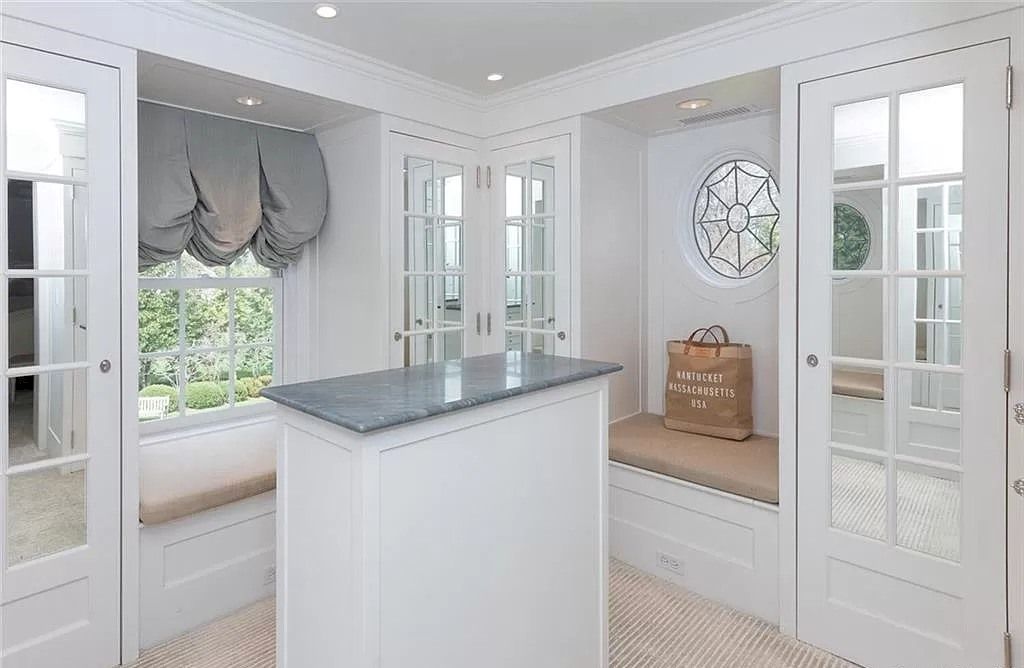 The Home in Connecticut is an extraordinary home with gracious entrance and amazing wine cellar now available for sale. This home located at 8 Searles Rd, Darien, Connecticut; offering 04 bedrooms and 07 bathrooms with 7,613 square feet of living spaces.