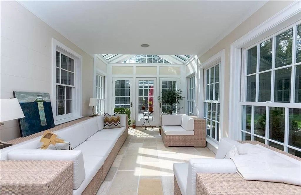 The Home in Connecticut is an extraordinary home with gracious entrance and amazing wine cellar now available for sale. This home located at 8 Searles Rd, Darien, Connecticut; offering 04 bedrooms and 07 bathrooms with 7,613 square feet of living spaces.