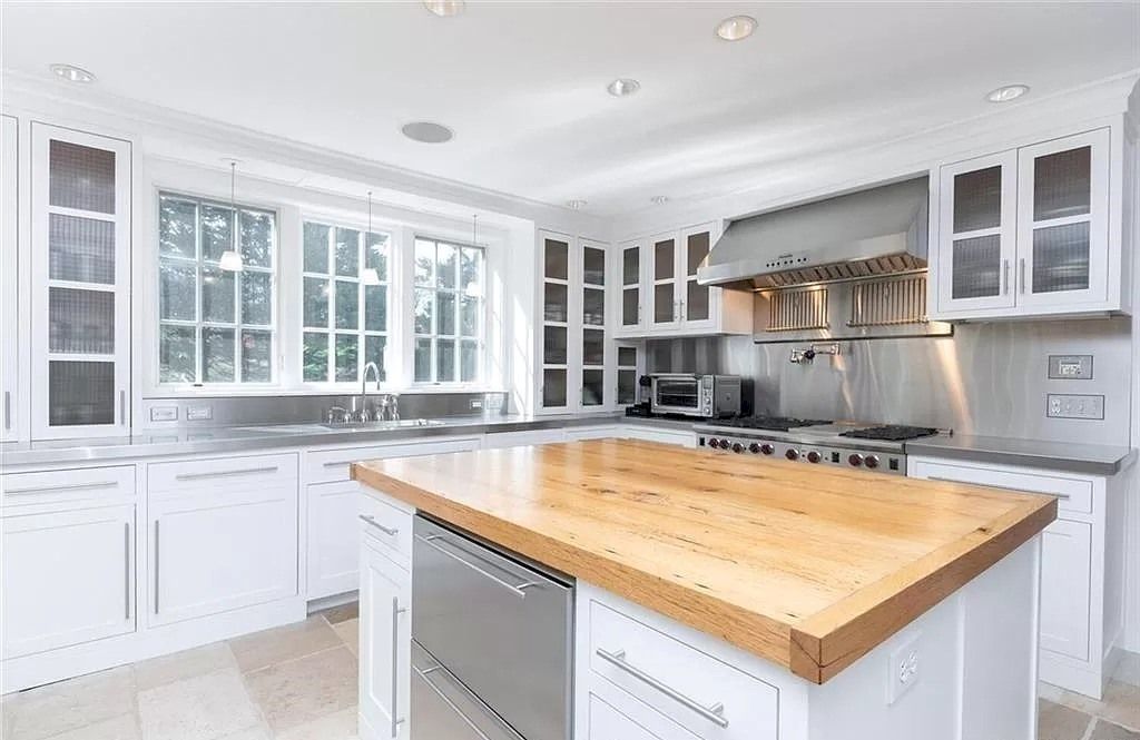 The Home in Connecticut is an extraordinary home with gracious entrance and amazing wine cellar now available for sale. This home located at 8 Searles Rd, Darien, Connecticut; offering 04 bedrooms and 07 bathrooms with 7,613 square feet of living spaces.