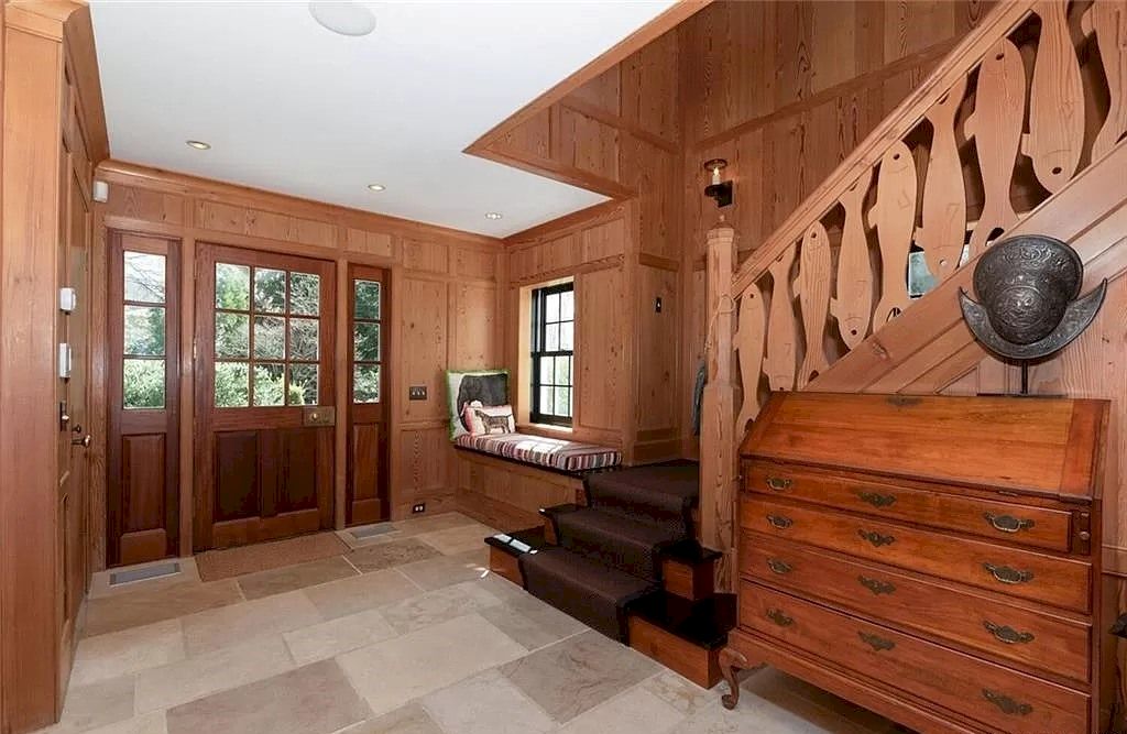 The Home in Connecticut is an extraordinary home with gracious entrance and amazing wine cellar now available for sale. This home located at 8 Searles Rd, Darien, Connecticut; offering 04 bedrooms and 07 bathrooms with 7,613 square feet of living spaces.
