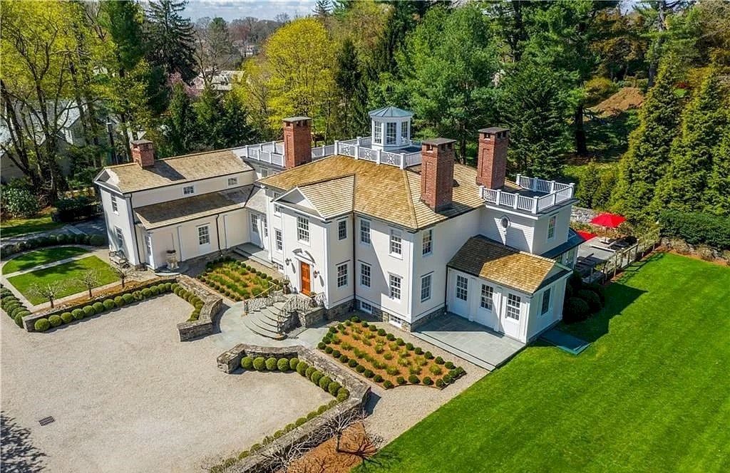 The Home in Connecticut is an extraordinary home with gracious entrance and amazing wine cellar now available for sale. This home located at 8 Searles Rd, Darien, Connecticut; offering 04 bedrooms and 07 bathrooms with 7,613 square feet of living spaces.