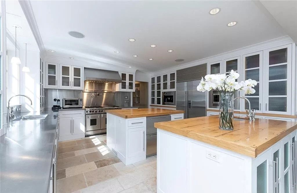 The Home in Connecticut is an extraordinary home with gracious entrance and amazing wine cellar now available for sale. This home located at 8 Searles Rd, Darien, Connecticut; offering 04 bedrooms and 07 bathrooms with 7,613 square feet of living spaces.