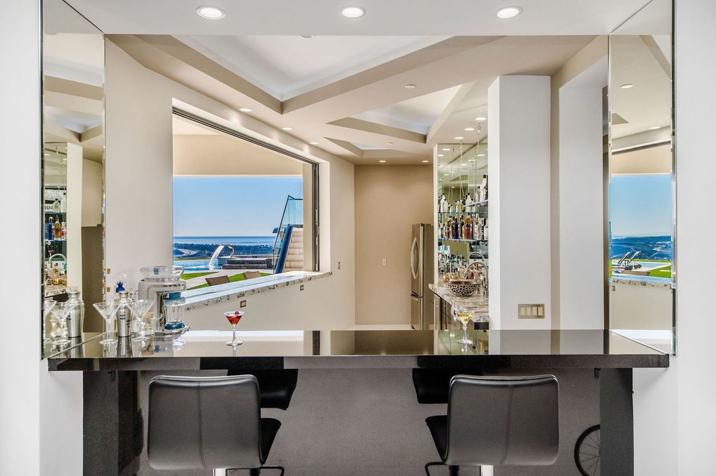 The Villa in Laguna Niguel is a stunning secluded hilltop estate that sets the bar for luxury and elegance in one of the most coveted gated communities in Orange County now available for sale. This home located at 13 Old Ranch Rd, Laguna Niguel, California