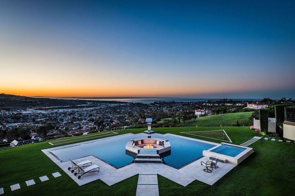 The Villa in Laguna Niguel is a stunning secluded hilltop estate that sets the bar for luxury and elegance in one of the most coveted gated communities in Orange County now available for sale. This home located at 13 Old Ranch Rd, Laguna Niguel, California