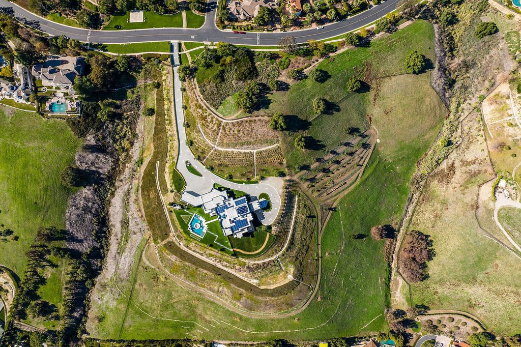 The Villa in Laguna Niguel is a stunning secluded hilltop estate that sets the bar for luxury and elegance in one of the most coveted gated communities in Orange County now available for sale. This home located at 13 Old Ranch Rd, Laguna Niguel, California