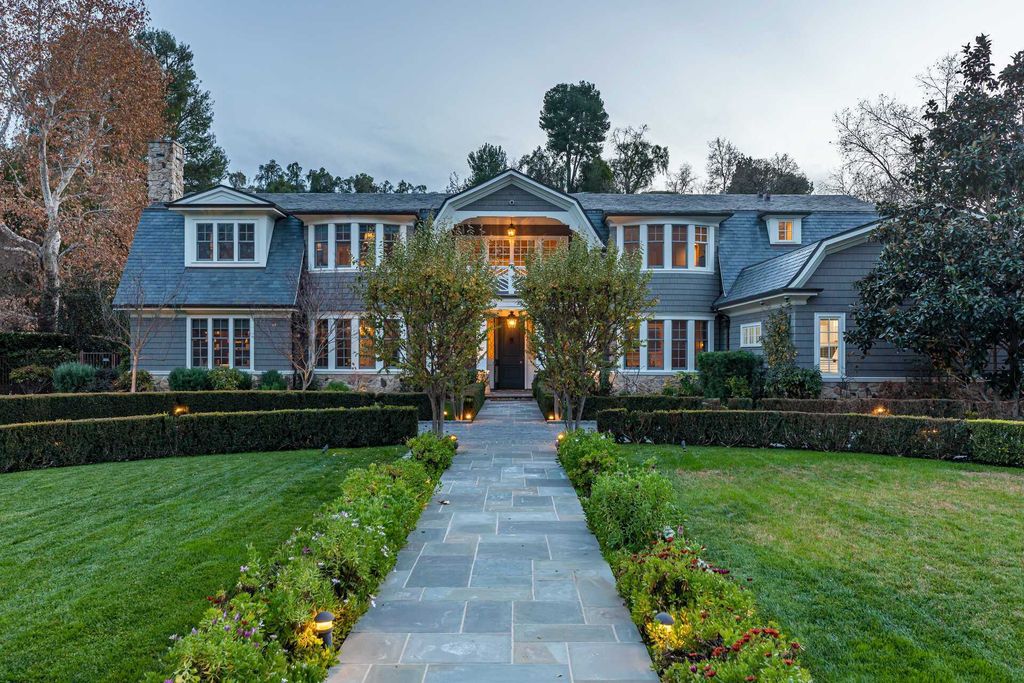 The Home in Hidden Hills is a stunning Dutch Colonial with outdoor kitchen make for the ultimate in estate living now available for sale. This home located at 23870 Long Valley Rd, Hidden Hills, California;