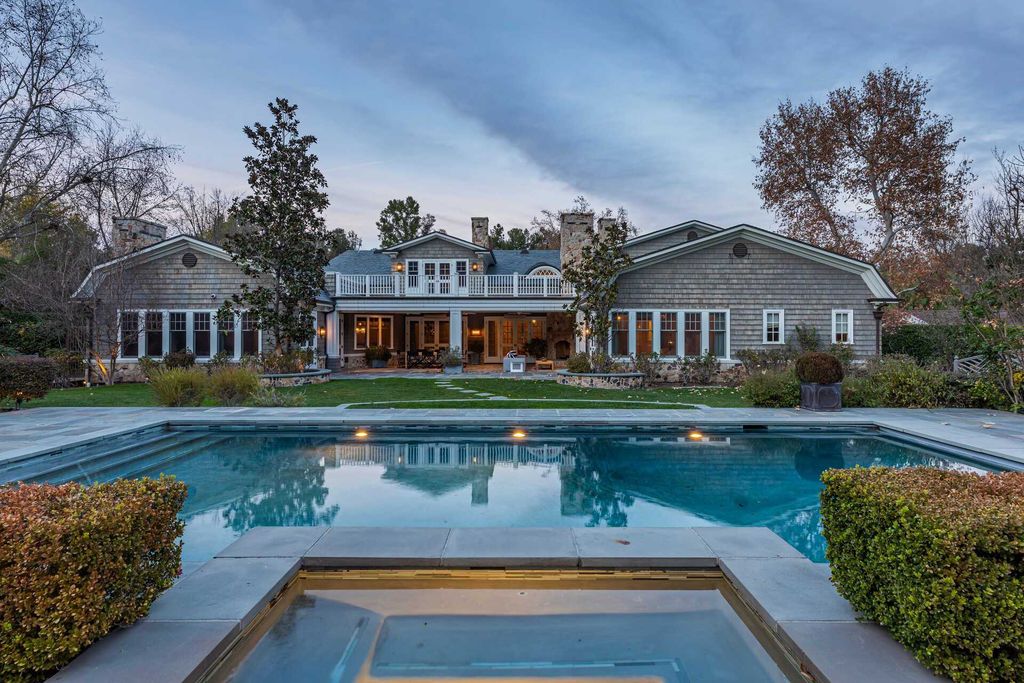 The Home in Hidden Hills is a stunning Dutch Colonial with outdoor kitchen make for the ultimate in estate living now available for sale. This home located at 23870 Long Valley Rd, Hidden Hills, California;