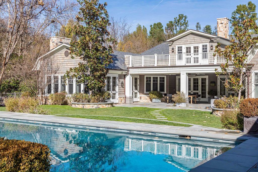 The Home in Hidden Hills is a stunning Dutch Colonial with outdoor kitchen make for the ultimate in estate living now available for sale. This home located at 23870 Long Valley Rd, Hidden Hills, California;