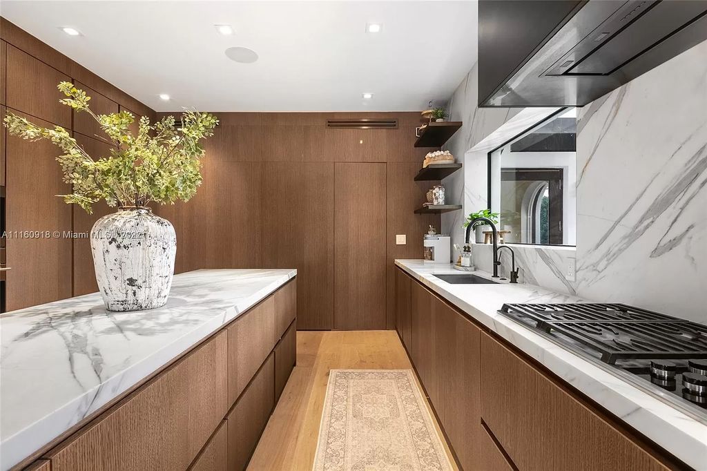 The Villa in Miami Beach is a breathtaking transitional Spanish villa was masterfully renovated featuring the highest quality finishes now available for sale. This home located at 5401 Pine Tree Dr, Miami Beach, Florida