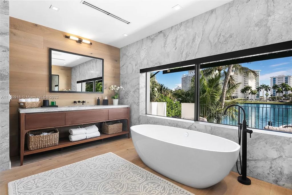The Villa in Miami Beach is a breathtaking transitional Spanish villa was masterfully renovated featuring the highest quality finishes now available for sale. This home located at 5401 Pine Tree Dr, Miami Beach, Florida